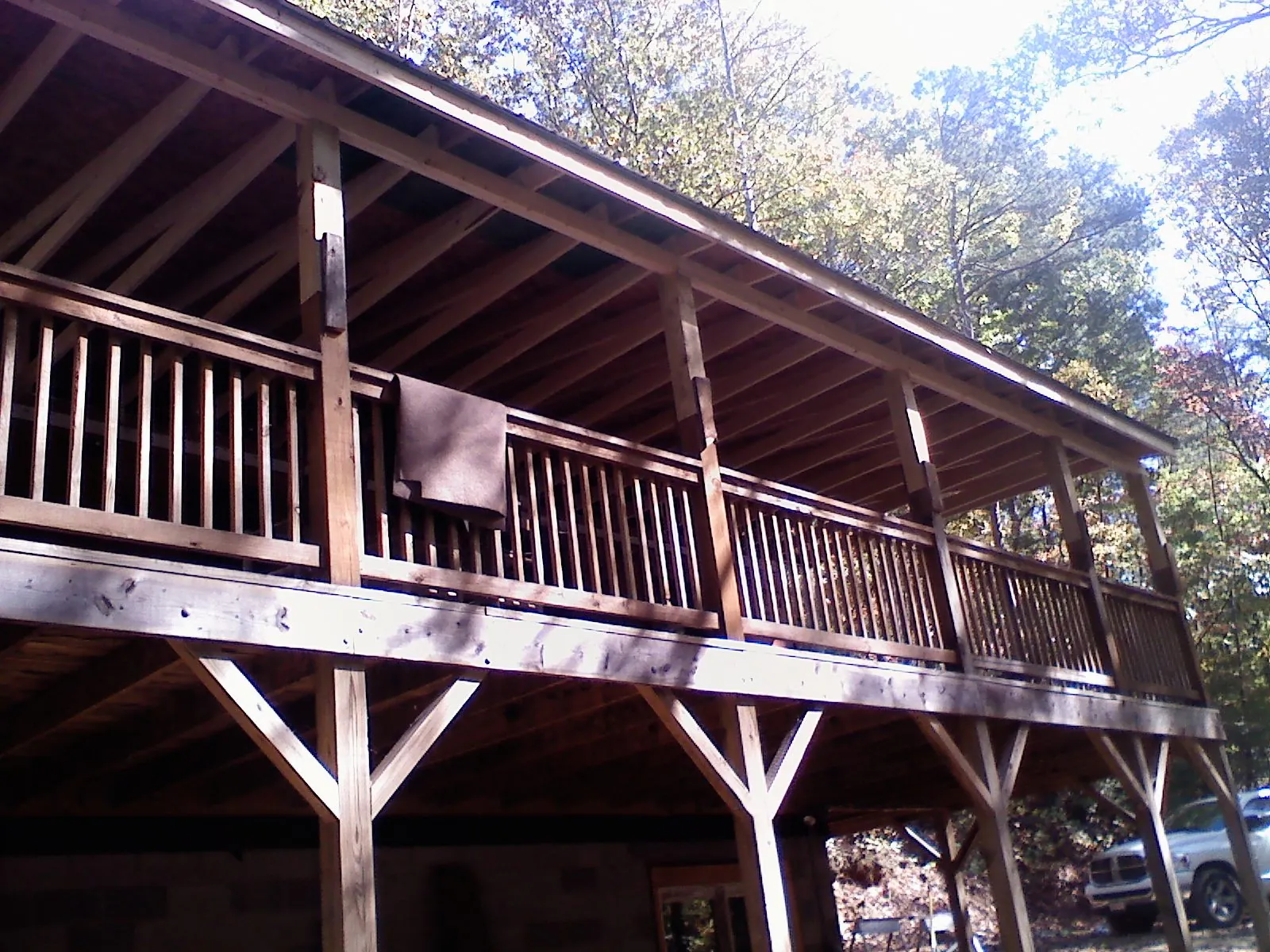 Timber framing under a new elevated porch and deck — Roof Leak Repair in Wilkeson by Roofing Brothers